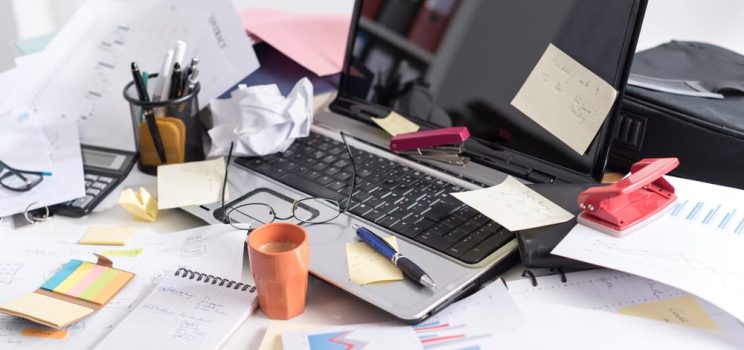 How can I motivate my employees to clean their desks