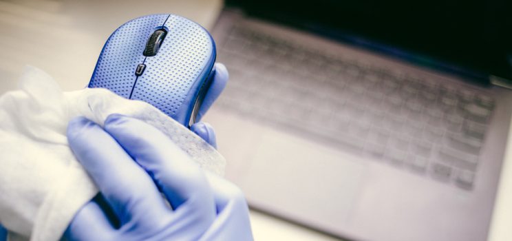 What is the most effective way to clean desks